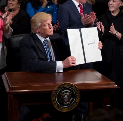 President Trump signing legislation